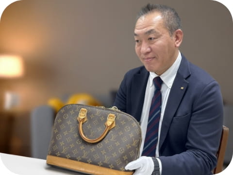 内洞　憲一